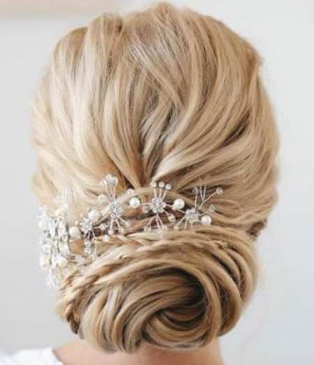 swirled wedding updo with embellishment wedding hair updos for elegant brides