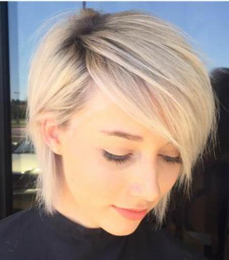 Side parted pixie bob with dark roots short blonde hairstyles and haircuts