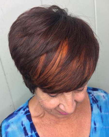 Side swept with brunette hairstyles and haircuts for women over 60