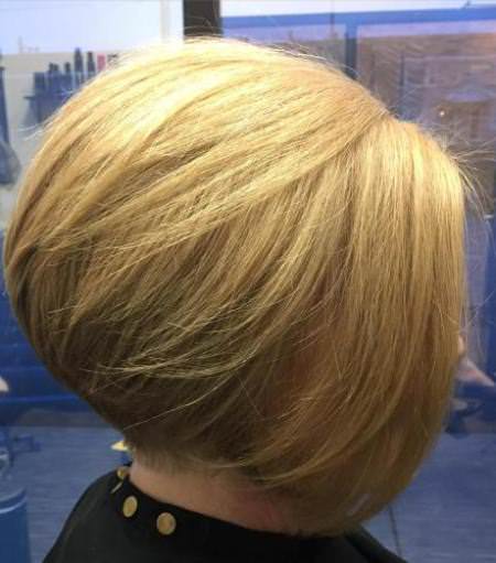 rounded bob with swoopy layers hairstyles and haircuts for women over 60