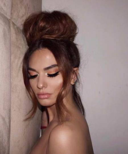 top knot bun iconic braid hairstyles